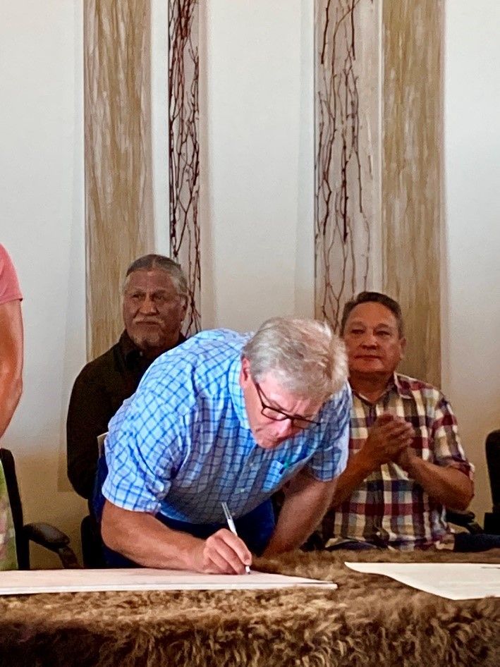 Les Kroeger, President of the CBA Signing Buffalo Treaty